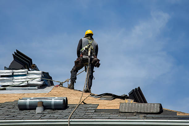 Professional Roof Replacement technician working in Clayton, IN